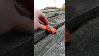 Orange car is falling down the pallet