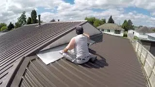 Wash and paint metal roof spray painting