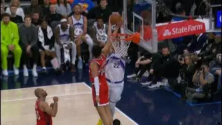 Yanic Konan Niederh&auml;user rejects the two-handed dunk attempt by Kyle Filipowski