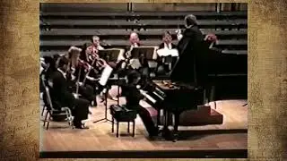 Greg Magarshak plays the  piano at a concert
