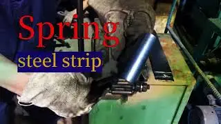 Rolling shutter door spring steel strip bending and flatness inspection