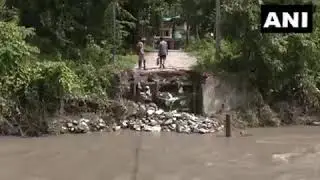 Alipurduar, West Bengal: Due to flash floods, the water level of the Holong River..