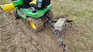 Testing a cultivator attachment with a John Deere X380