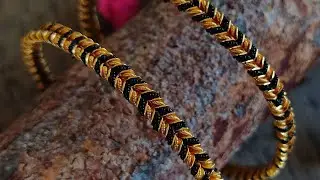 Black bead gold bangles