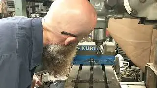 Machining a couple of stainless steel shafts.