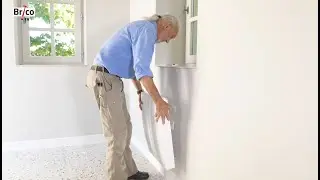 Installer un radiateur électrique à fluide caloporteur - Tuto bricolage avec Robert