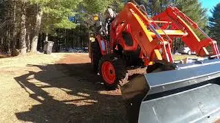 Grading the driveway with the Kioti CK3510SE Tractor Loader Bucket