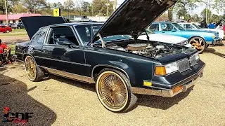 Oldsmobile Cutlass on All Gold Spokes and Vogues.