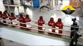 12 heads automatic gravity liquid filling machine