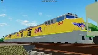 UP 7360 leads CSX B780