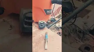 shipping dust while cutting concrete with a 4 1/2 inch angle grinder on the cut groove catches dust