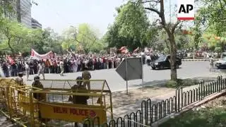 Thousands of cheering supporters welcomed India's next prime minister, Narendra Modi, in the capital