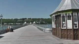 Walking on Garth Pier at Bangor Gwynedd in North Wales