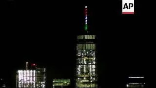 Spire of NY WTC lit up in colours of Italy flag