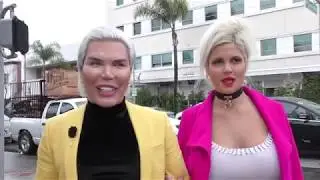 Rodrigo Alves and Sophia Vegas discuss skincare products during a rainstorm in Beverly Hills