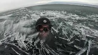 Swimming in on Oceon of lce Needlec