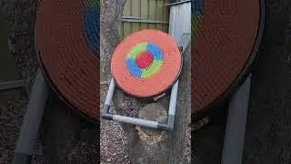 Nox hits archery target with an AXE while FRONT FLIPPING!