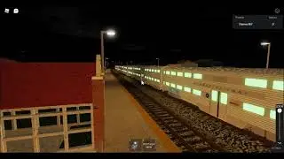 The metra express train plays jingle bell at Belmont station
