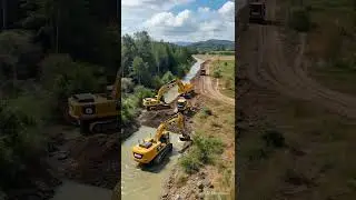 A cinematic drone shot shows JCB backhoe