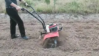 4 stroke mini gasoline tiller ; Tilling width could adjust from 460mm to 750mm .