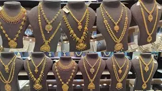 Kalyan Jewellers Ruby Emerald Wedding Sets with Price/ Ruby Wedding Jewels
