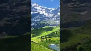 Ice, Mountains & Green Field #RelaxingNatureVideos #TravelSceneryKJ