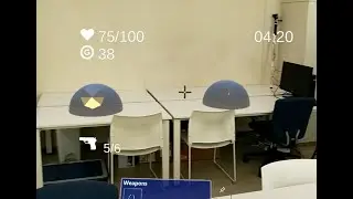An Asymmetric Multiplayer Augmented Reality Game with Spatial Sharing of a Physical Environment