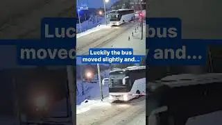Bus narrowly misses train collision