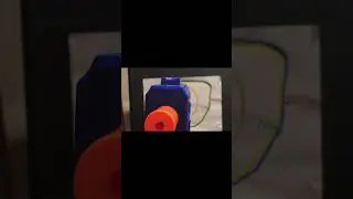 Playing My handmade dart board with a nerf blaster