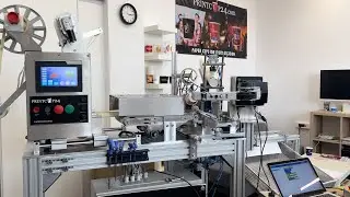 Printcup24 machine with robotic arm