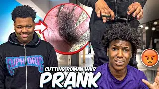 CUTTING ROMAN HAIR PRANK‼️ (HE HIT ME IN MY JAW)💔