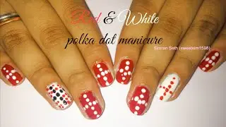 red and white polka dot manicure