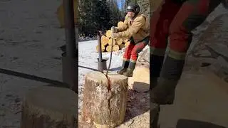Splitting a Giant Log by Hand
