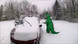 Inflatable costume team clearing tons of snow on a winter day.