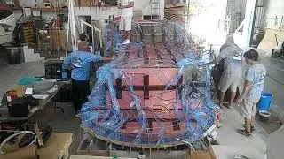 Fiberglass resin infusion on a boat cockpit