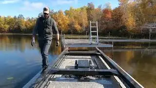 REALLY DEEP AND LONG dock pipes! Dock removal with fork barge!