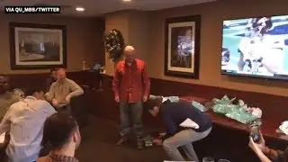 Quinnipiac basketball coach surprises player with scholarship during Secret Santa | ESPN