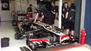 Lotus F1 car revving in pit