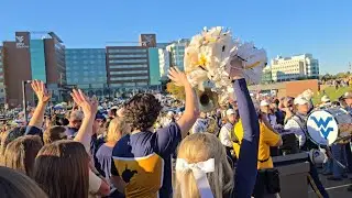 waving to children at Children's Hospital after WV Mountaineer Mantrip (October 19th, 2024)