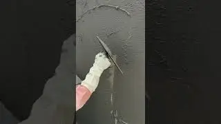 First Stage of Wall Finishing with Black Cement