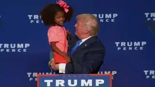 Donald Trump brings young fans onstage