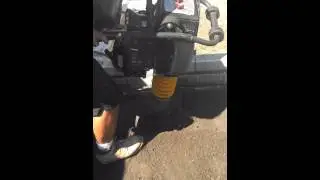Jumping jack tamper