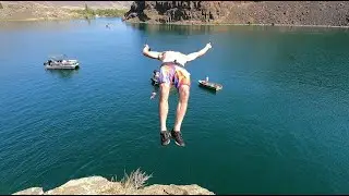 Four Dudes in a Row Boat Go Cliff Jumping