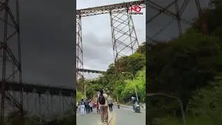 Firefighter Santa Rappels Bridge to Give Gifts