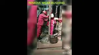Retrieving Wear Bushing from Well Head.