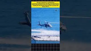 U.S. Navy Commando Rappels Onto Aircraft Carrier Deck