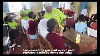 11th November, 2021; Embulbul Primary; Milkah demonstrating the Mina cup.