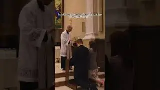 Catholic betrothal ceremony: Our engagement rings are blessed by the priest.