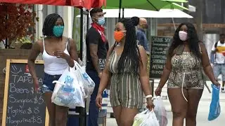 Masks up in Miami Beach as Florida reports over 15K new virus cases | AFP