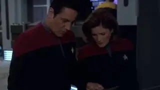 Janeway Notices the Dedication Plaque that Has Fallen Down